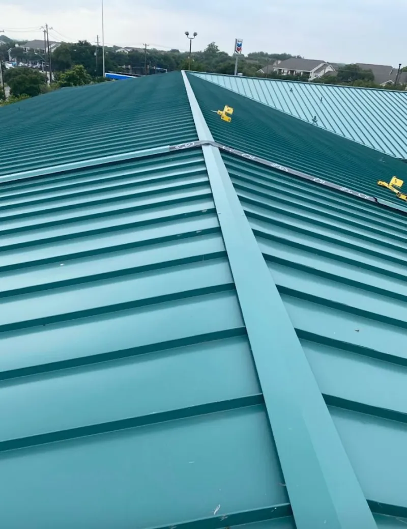 Green commercial metal roof ridge and valley for Metal Roof Repair in Windcrest